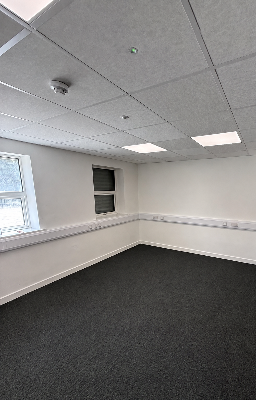 Completed room with coordinated electrical and life-safety systems